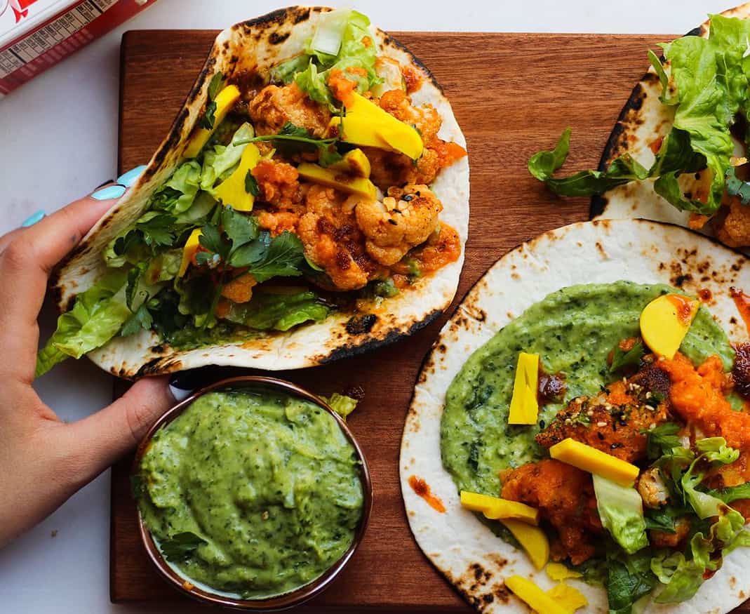 Buffalo Cauliflower Tacos with Herbed Avocado Sauce