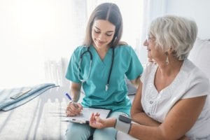 long term care dietitian with patient